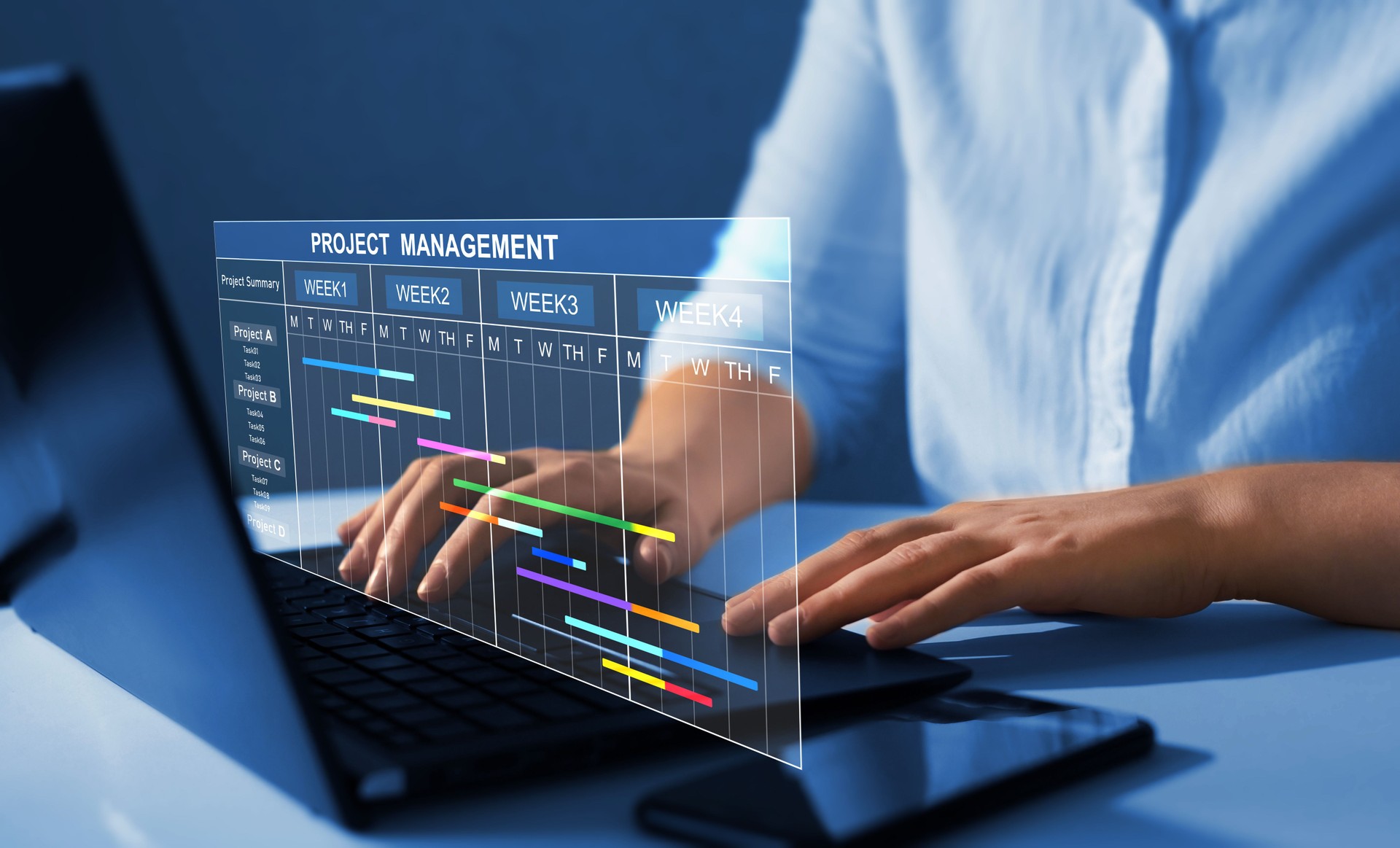 Project manager working on laptop and updating tasks and milestones progress planning with Gantt chart scheduling interface for company on virtual screen. Business Project Management System.